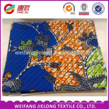 blue and orange colour with flower printing veritable wax block prints fabric